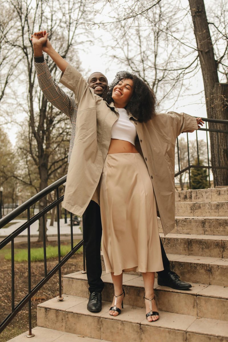 Joyful couple on steps